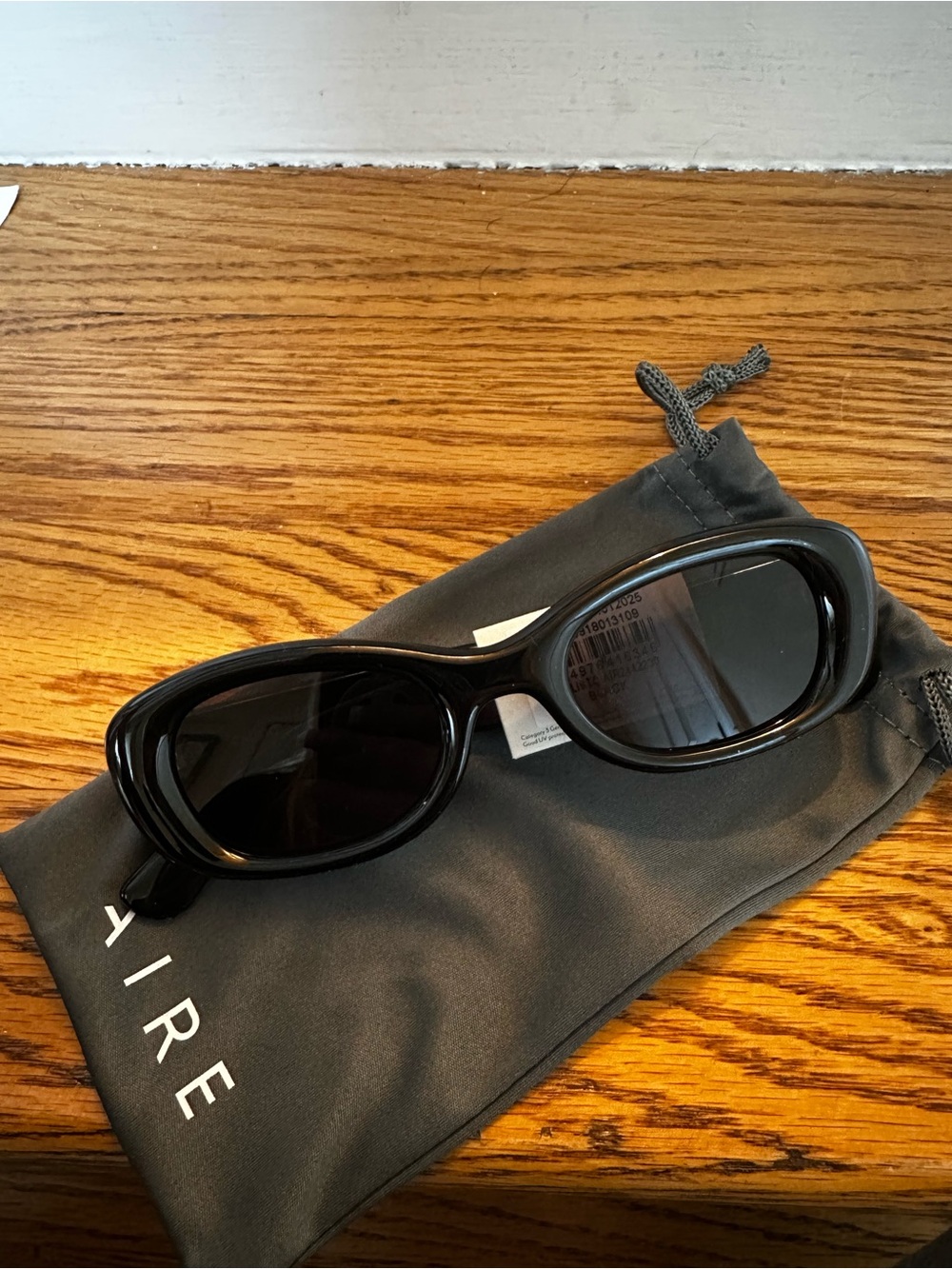 Sleek Black Oval Sunglasses